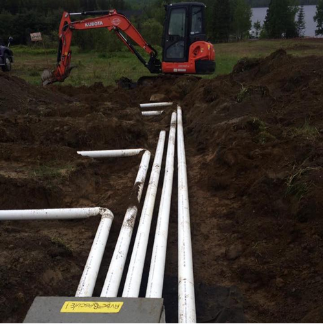 Installation conduits fosse septique par Excavation Rénovation Drolet