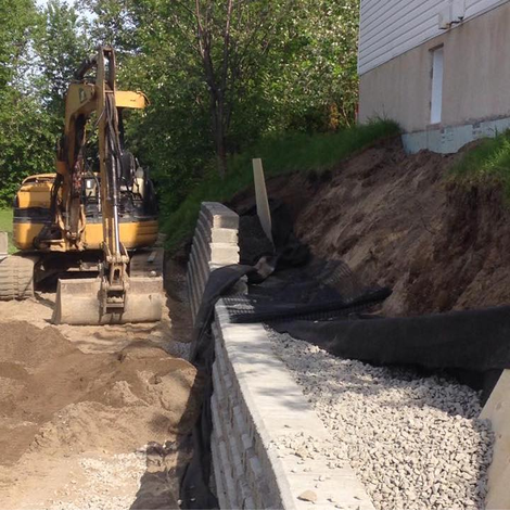 Installation de mur de soutènement – service par Excavation PJS
